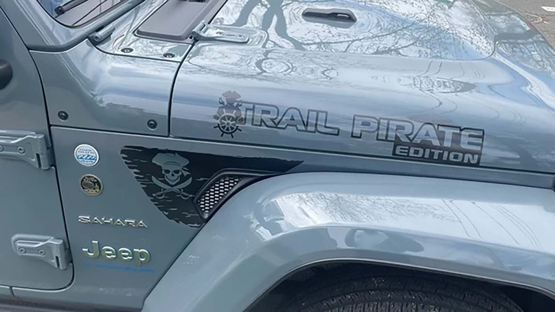 Anvil Gray Jeep Wrangler with a side hood decal, one of Jeep's many gray paint shades