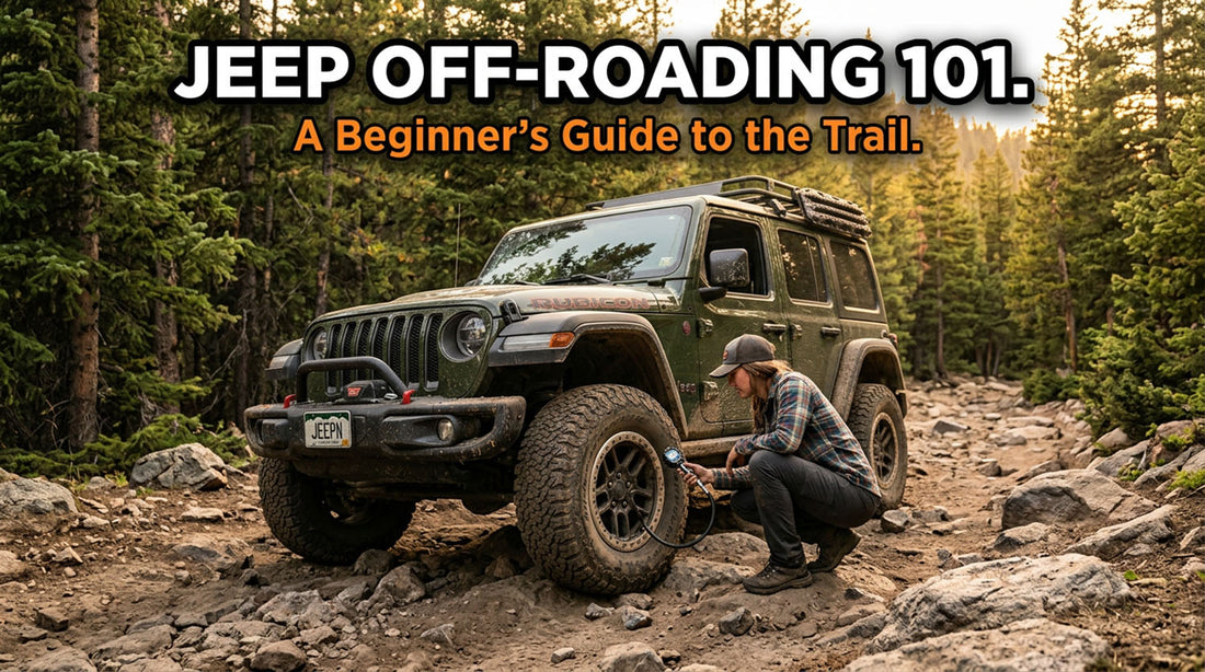 A green four-door Jeep Wrangler Rubicon with a roof rack on a rocky forest trail while a person in a plaid shirt crouches at the front tire adjusting air pressure, under a headline reading Jeep Off-Roading 101