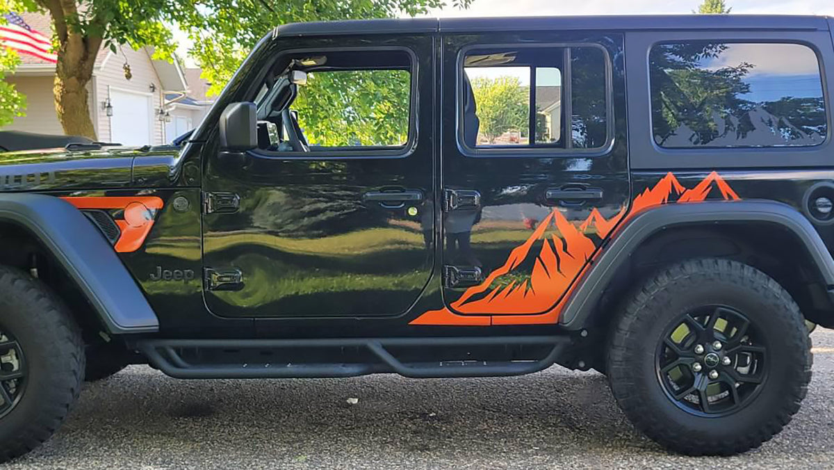 Mountain range fender vent decal installed on a Jeep Wrangler side vent panel