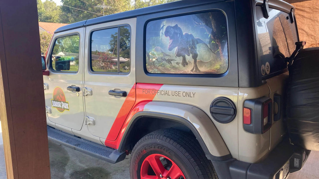 Red and grey Jeep Wrangler YJ in a Jurassic Park tour-fleet-inspired build