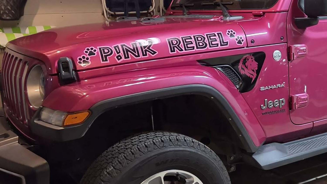 Tuscadero pink Jeep Wrangler with its name in a custom side hood decal