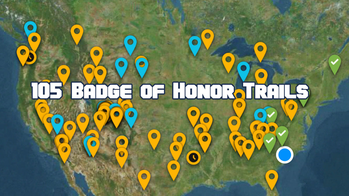 Jeep Badge of Honor app map of the United States covered in yellow, blue and green check-marked trail pins from the Pacific coast to the Atlantic, under a headline reading 105 Badge of Honor Trails