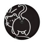A black and white image of a cat with a camera attached to its tail.
