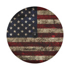 Rustic American flag spare tire cover on black Jeep Wrangler with Graffix plate showing distressed flag artwork