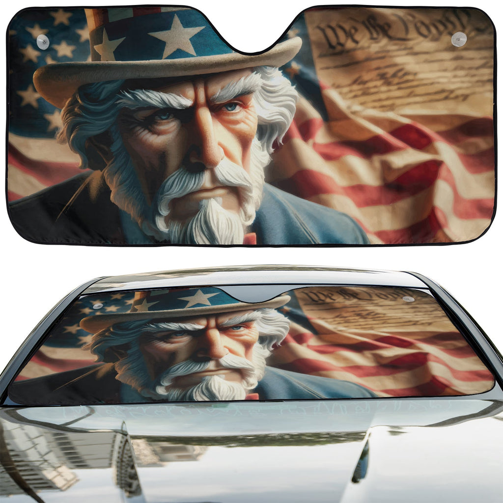 Uncle Sam We the People accordion sunshade installed in a sedan windshield on a sunny urban street view