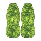 a pair of green, furry objects that appear to be made of a soft, fuzzy material.