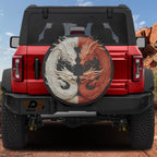 Balance of the Dragons spare tire cover on red Ford Bronco rear featuring sculpted twin dragon artwork