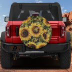 Sunflower and Bumblebee Bliss spare tire cover on a red Jeep Wrangler with bright yellow florals