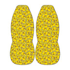 a pair of yellow duck-shaped objects, each filled with numerous yellow duck images, creating a visually striking and playful design.