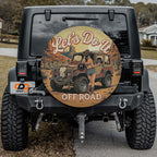 a black Jeep Wrangler with a large, round decal on the rear window that says "Let's Do It" and "Off Road".