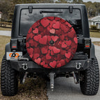 Love on Wheels spare tire cover main product render with romantic red heart all-over pattern