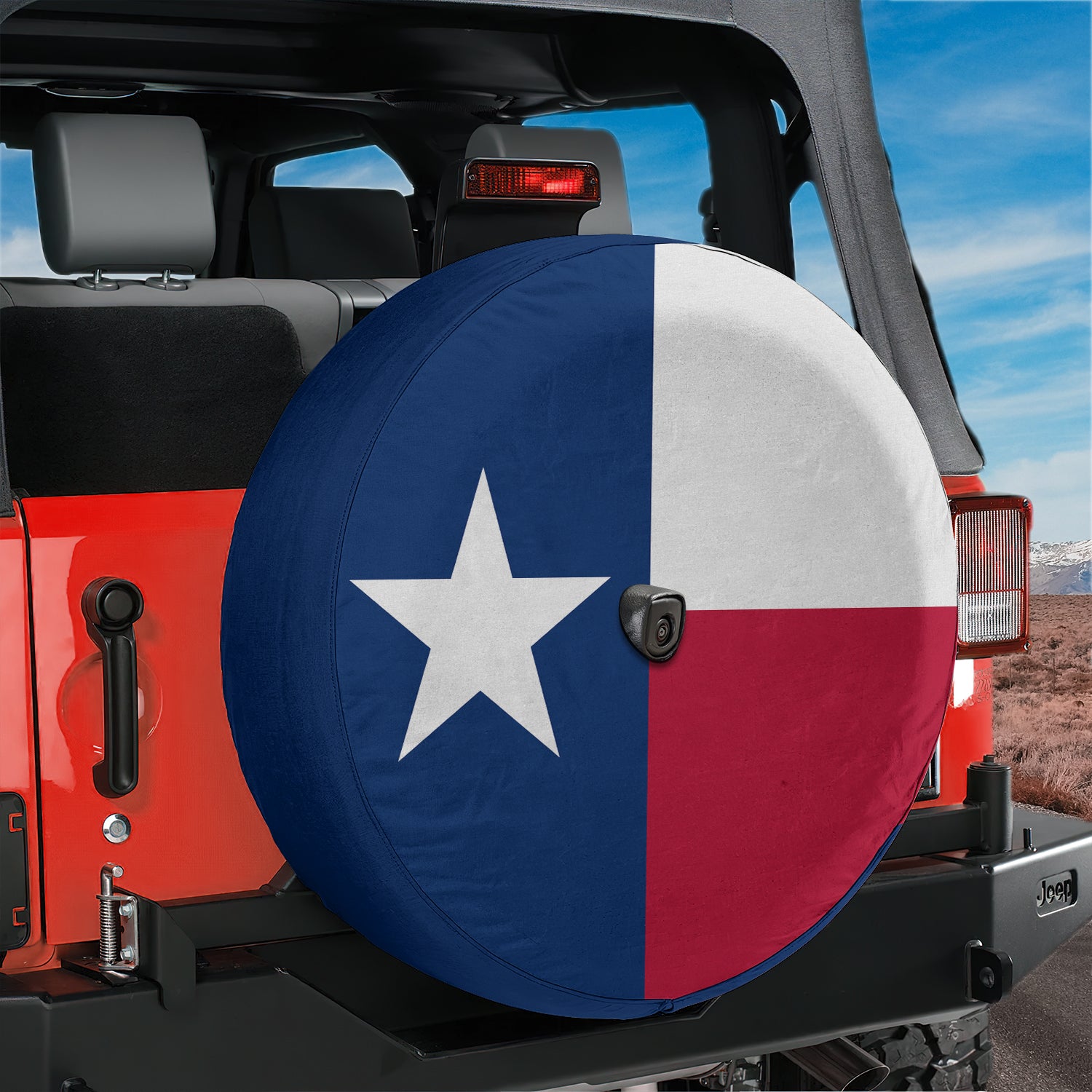 Texas state flag spare tire cover mounted on red Ford Bronco rear with red rock canyon backdrop and Lone Star