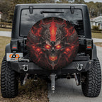 Emberlord Skull spare tire cover installed on black Jeep Wrangler with GRAFFIX license plate