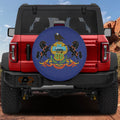 Pennsylvania state flag spare tire cover mounted on red Ford Bronco rear with red rock canyon backdrop