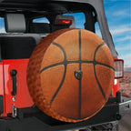 Basketball spare tire cover closeup detail of orange basketball printed graphic artwork