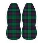 two identical car seat covers with a plaid pattern in shades of green and red.