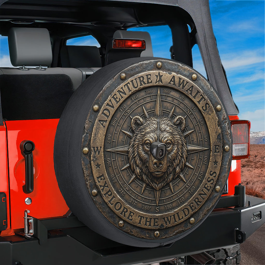 a red Jeep with a large, decorative spare tire cover on the back. The cover has a bear head design and the words "Adventure Awaits" and "Explore the Wilderness" written on it.