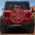Love on Wheels spare tire cover on red Bronco showing matte layered red Valentine hearts design