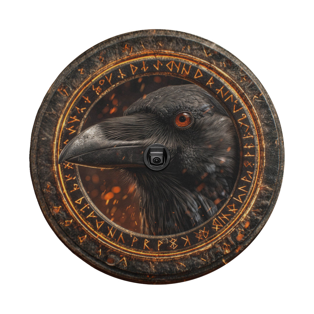 a close-up of a black bird, possibly a crow, with a camera lens in the center of a circular frame.