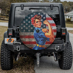 WWII Labor Woman spare tire cover with Rosie pin-up mounted on black Jeep Wrangler CDD GRAFFIX