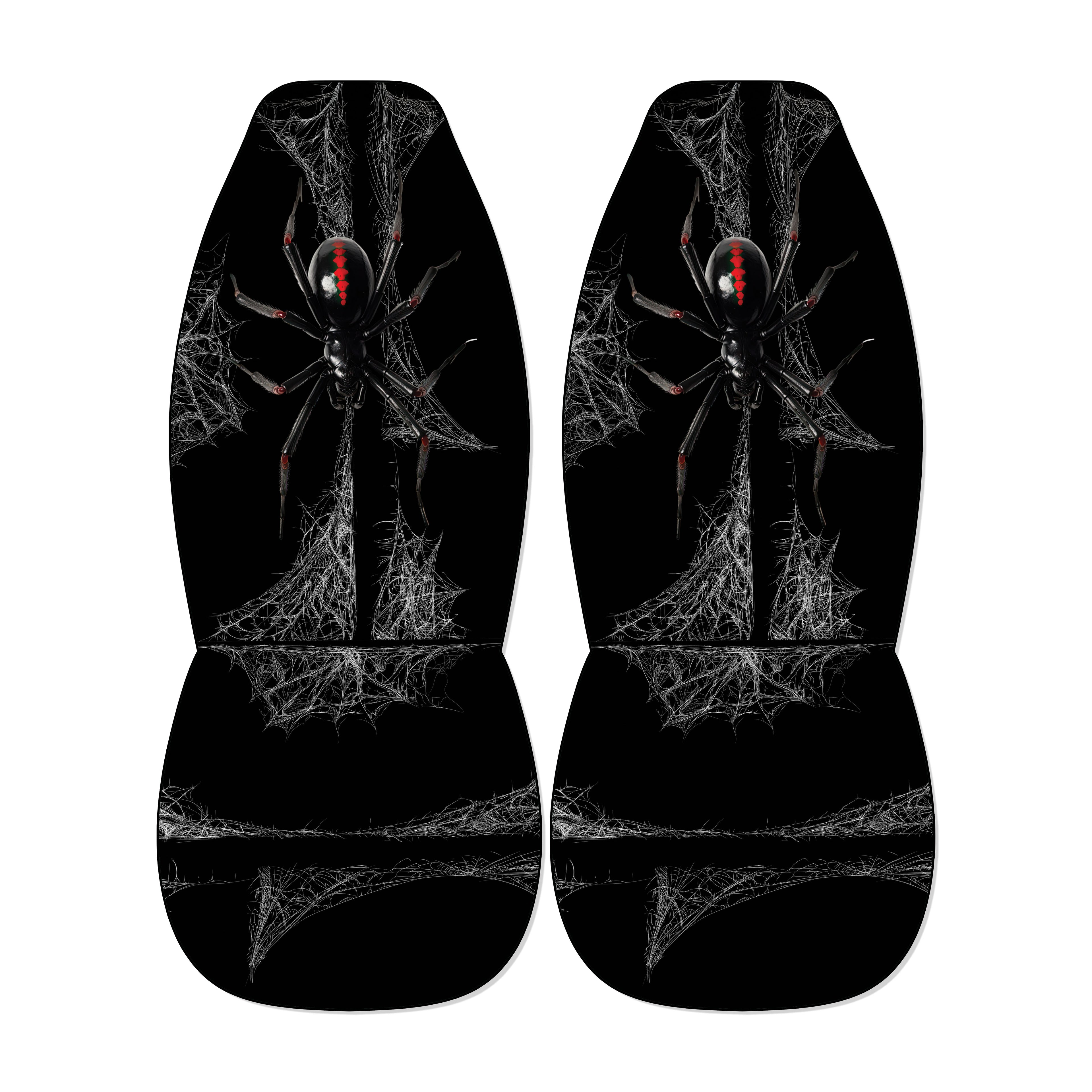 a pair of black car seat covers with a spider design on them.