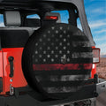 Thin Red Line Subdued American Flag spare tire cover on a red Jeep Wrangler with a distressed black flag design