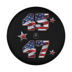 A black wheel cover with the numbers "45" and "47" printed on it, along with American flag designs and stars.
