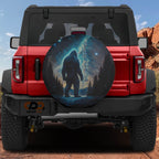 Celestial Yeti Chronicles spare tire cover with mystical sasquatch under starry galaxy sky