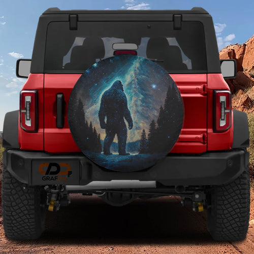 Celestial Yeti Chronicles spare tire cover with mystical sasquatch under starry galaxy sky