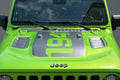 Bright green Jeep Wrangler Rubicon featuring 1941 power-dome blackout hood decal front view