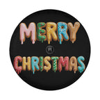 A black tire cover with the text "MERRY CHRISTMAS" written in colorful, dripping letters.