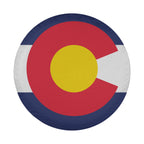 Colorado state flag spare tire cover on red Jeep Wrangler rear showing C logo and stripes outdoors