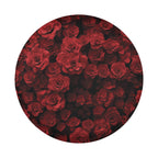 Wheel of Roses spare tire cover lifestyle scene showcasing layered crimson rose blooms art