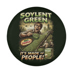 The image is a round sticker with a man in a factory setting, surrounded by green vegetables, and a large amount of soybeans. The sticker has a dark green background and features a man with a surprised expression.