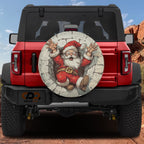 Santa's Great Chimney Escape spare tire cover on a red Jeep Wrangler showing the cartoon Santa stuck in a chimney