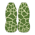 two green and white patterned objects, which appear to be animal-like or geometric shapes, set against a white background.
