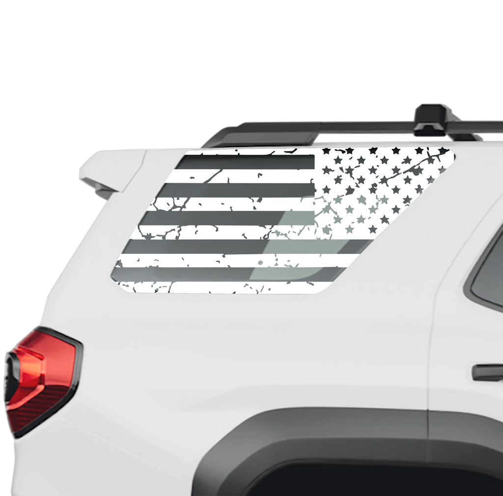 Tattered American flag rear quarter window vinyl decal in white on a 2025 Toyota 4Runner