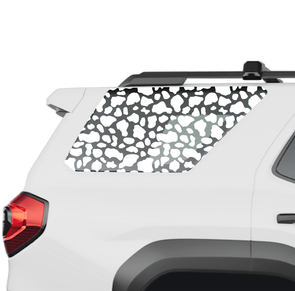 Cow print rear quarter window vinyl decal in white on a 2025 Toyota 4Runner