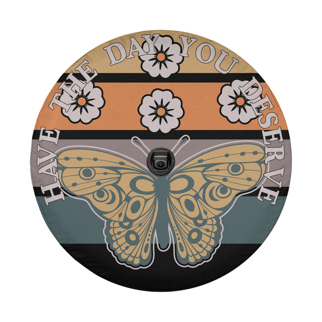 Monarch Have the Day You Deserve spare tire cover on red Jeep showing monarch butterfly skeleton art