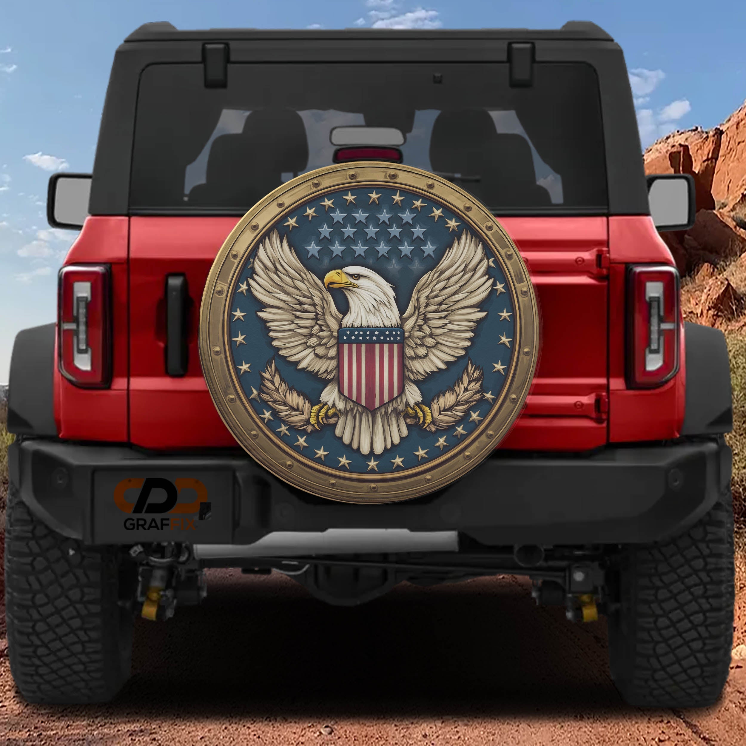 American Freedom Seal spare tire cover on a red Jeep Wrangler featuring the bald eagle and flag emblem on the rear