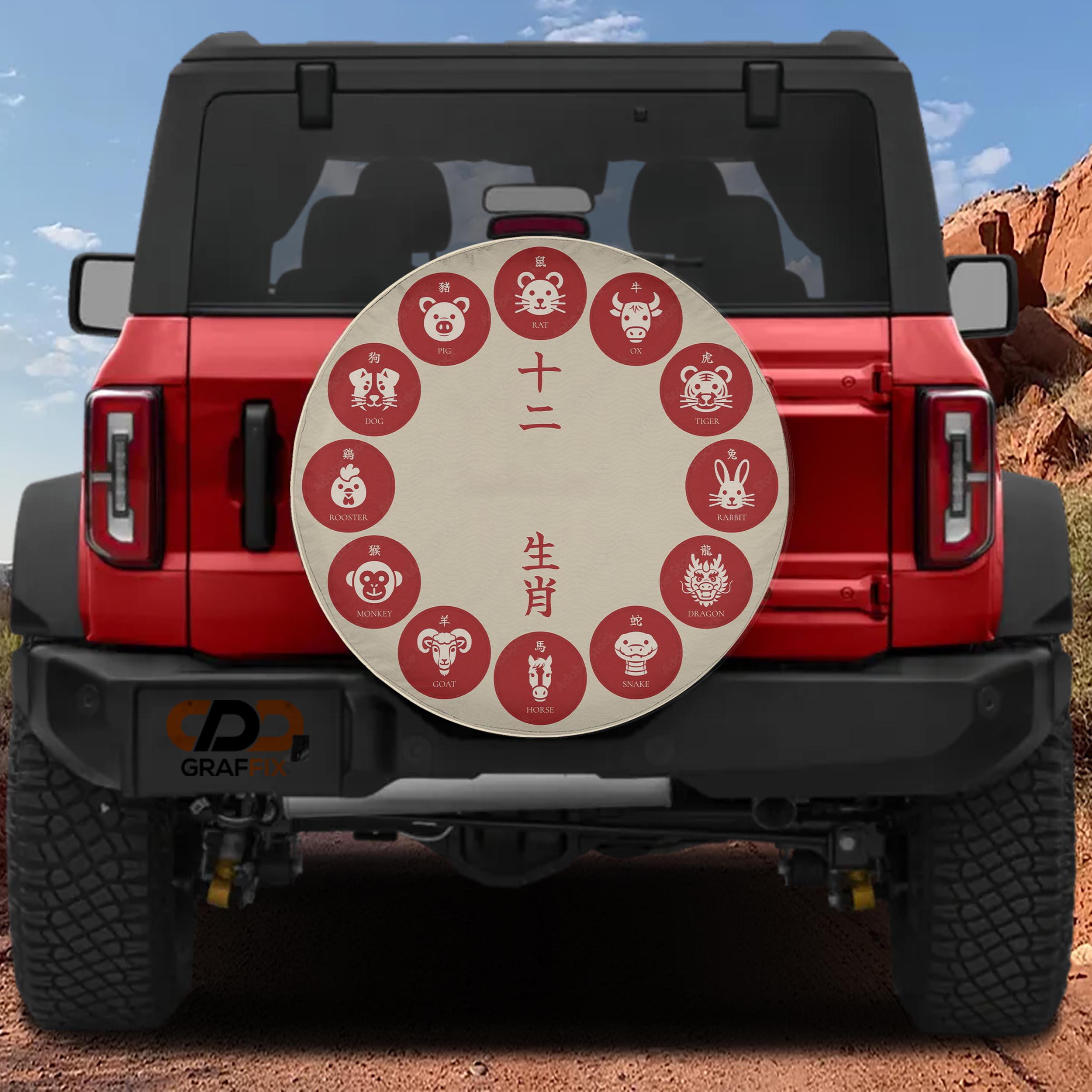 A red Jeep Wrangler with a round decal on the rear window, featuring various Chinese zodiac animals.