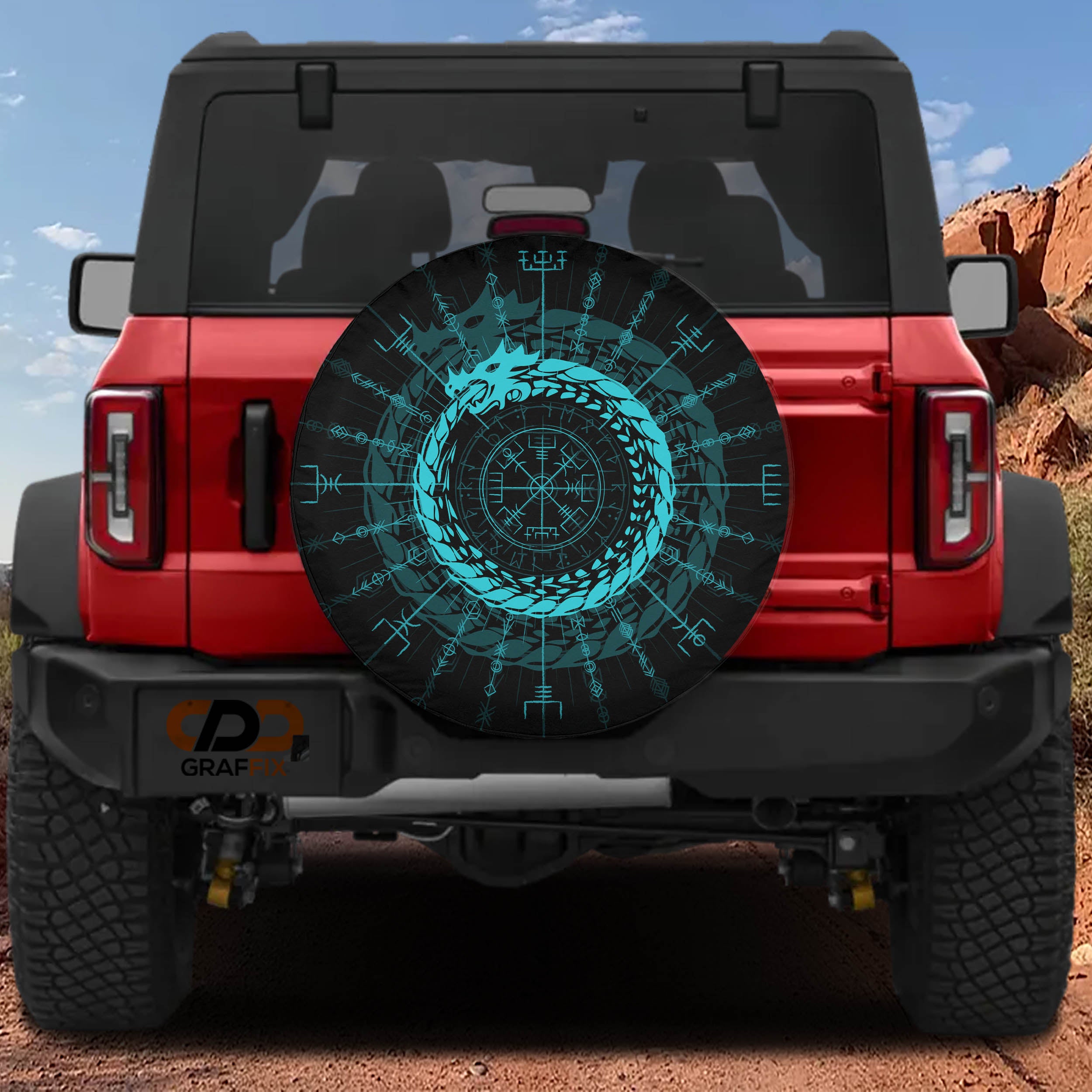 the rear view of a red Jeep Wrangler with a large, colorful wheel cover featuring a Viking symbol.