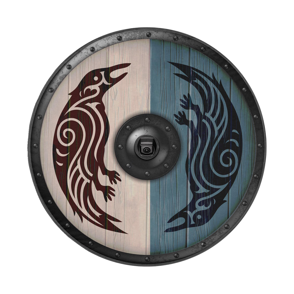 A wooden shield with a black and white design, featuring a bird-like creature on each side.