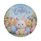 A round Easter-themed image featuring a white bunny sitting on a grassy area surrounded by Easter eggs, flowers, and birds. The bunny is holding an Easter egg in its paws, and the text "Happy Easter" is written above the bunny.