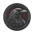 Flat Odin's ravens spare tire cover artwork showing Norse raven with red eye and Celtic knotwork shield design