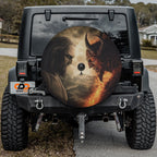 Heaven vs Hell Ultimate Battle spare tire cover on black Jeep Wrangler rear with deity confronting devil