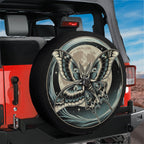 A large, detailed image of a butterfly with a moon and stars design on the tire of a red Jeep.