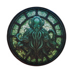 Cthulhu Rising stained glass spare tire cover mounted on a red Bronco rear hatch in a desert landscape scene