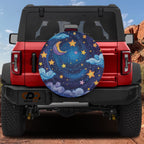 Starry Night Sky tire cover on a red Ford Bronco showing crescent moon stars and pastel clouds artwork