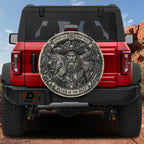 a red Jeep Wrangler with a large, detailed decal on the rear window depicting a pirate with a beard and hat.